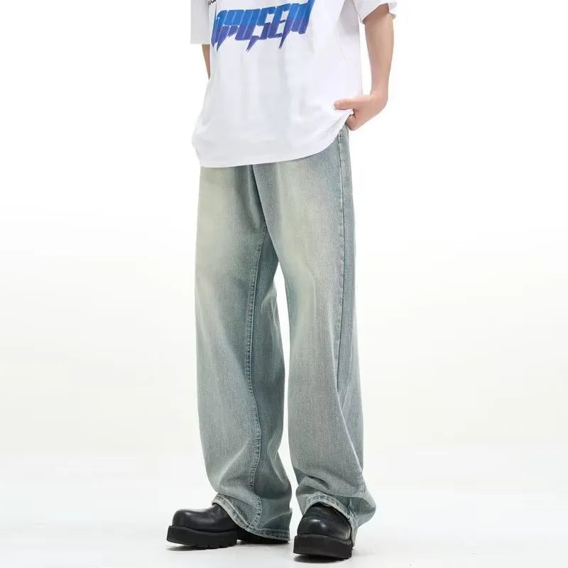 Blue men's loose casual trousers with a retro style and elasticated waistband.