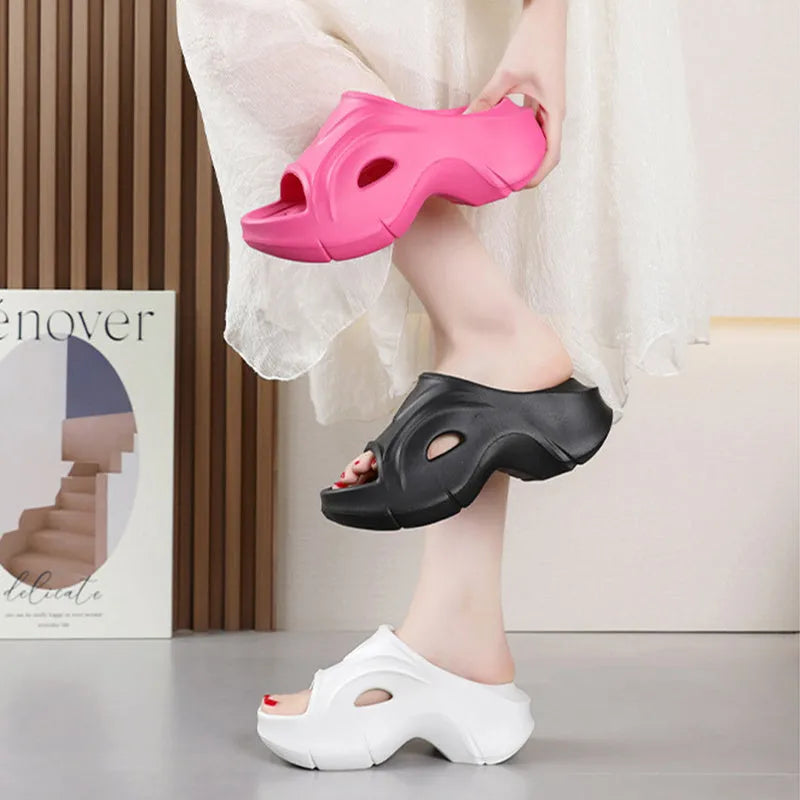 Women's thick-soled EVA foam slippers in white, black, and rose red colours with round toe design