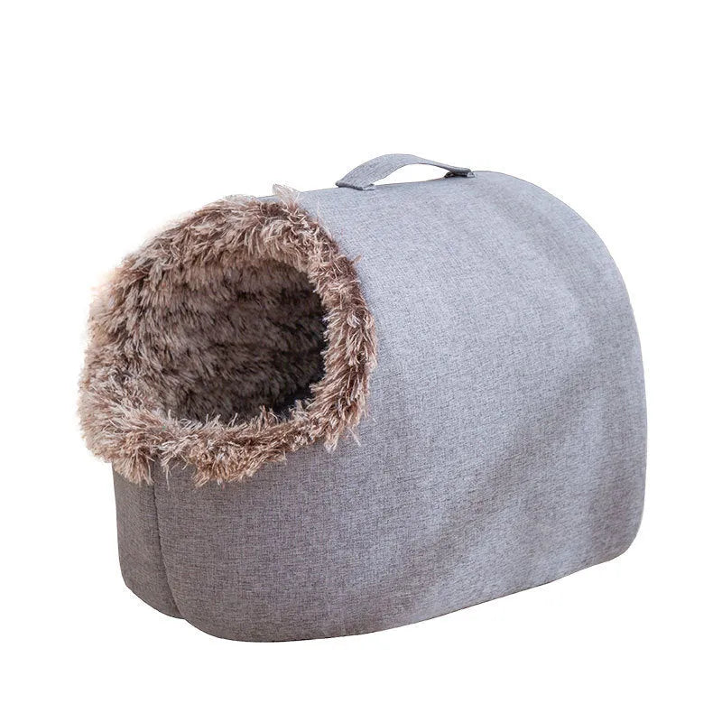 Grey fleece-lined enclosed cat sleeping bag nest showing closed design with warm interior