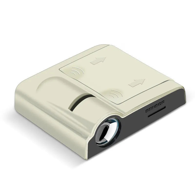 Compact black and beige ABS plastic car decorative projection radium lamp with battery compartment.