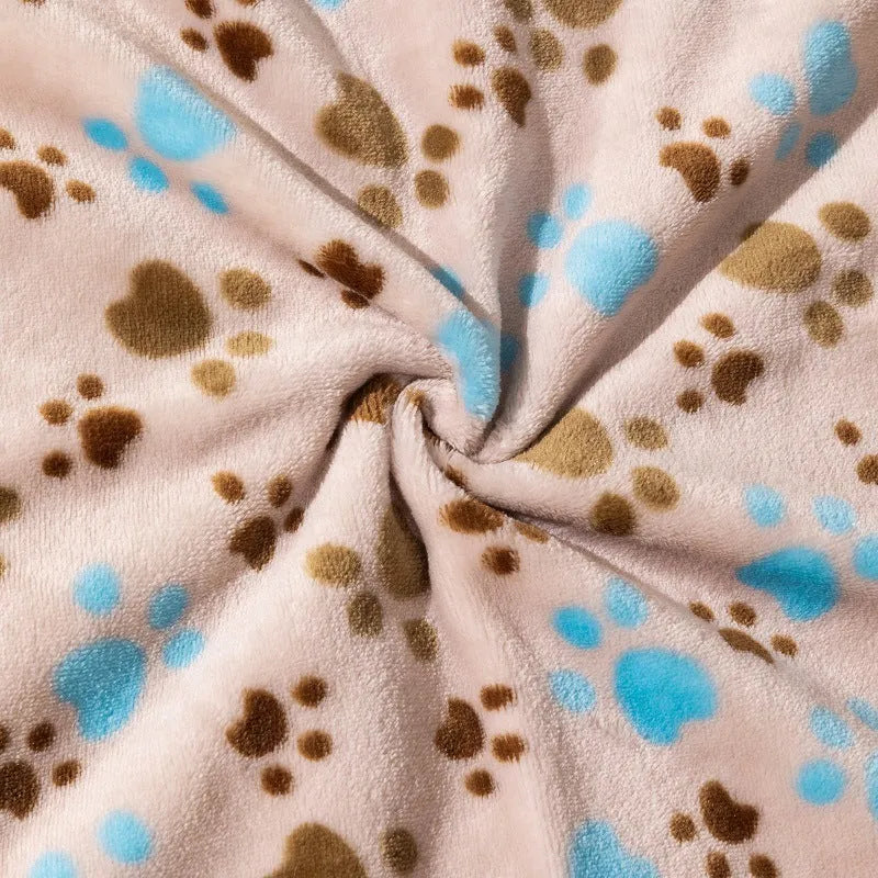 Blue cartoon dog pattern on a double-sided thickened flannel pet blanket laid flat.