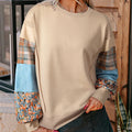 Women's long-sleeved polyester pullover top with plaid stitching pattern in loose fit
