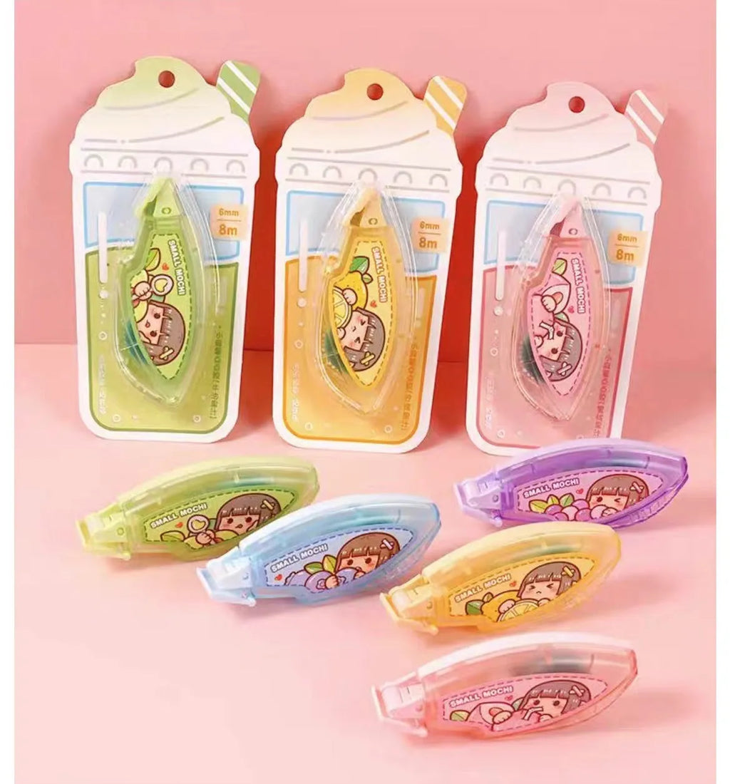 Dotting glue stationery adhesive in assorted fruit juice colours on a card pack.