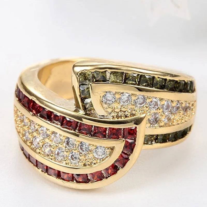 Gold-coloured peridot ring on display with alloy construction and women's sizing options