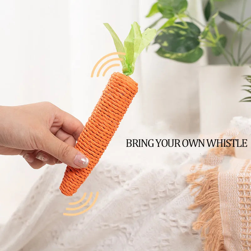 Assortment of interactive cat toys including carrot-shaped paper toys, ringing stones, and cat sticks in two sizes
