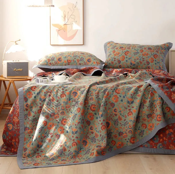 Cotton gauze three-piece bedding set with floral pattern including blanket and two pillowcases