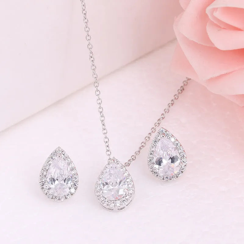 Women's water drop gemstone necklace and earrings jewellery set in copper and zircon, available in gold finish