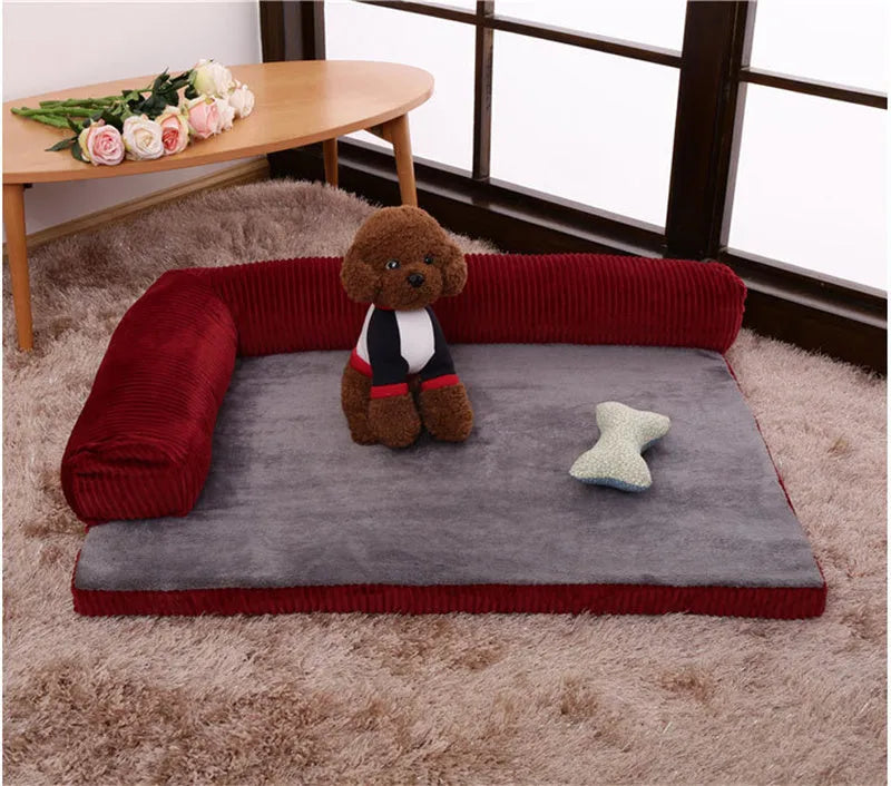 Corduroy bolster dog bed in grey colour with a non-slip base, shown in a large size for big dogs.