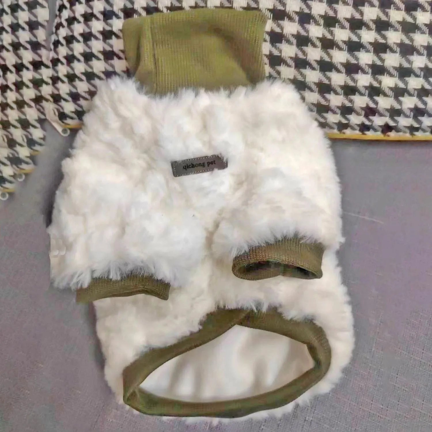 Creamy green turtleneck plush dog coat on small breed with detailed sizing chart showing chest and back measurements.