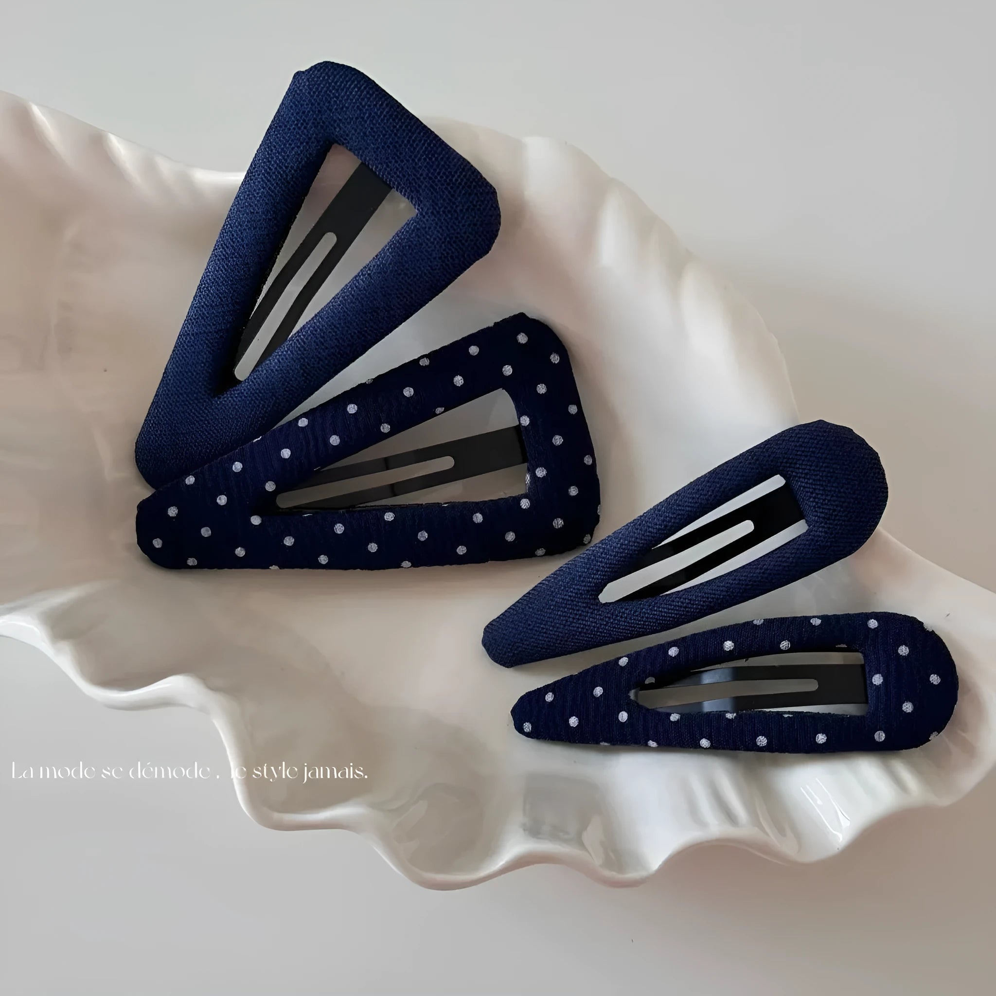 French retro dot pattern barrettes in triangle and water drop shapes with dark denim designs