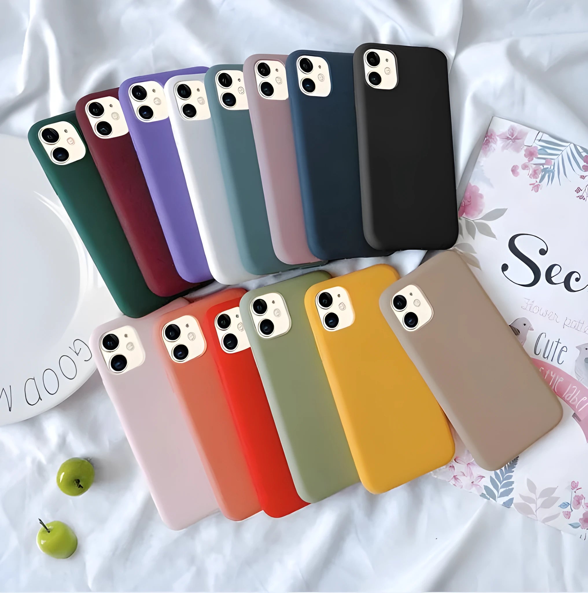 Frosted matte soft phone case for Apple iPhone models on a table.