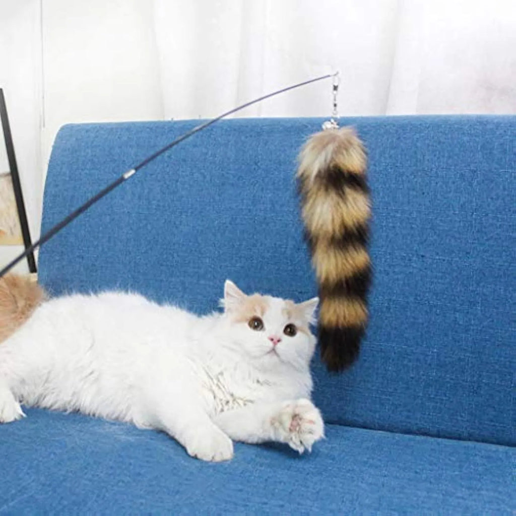 Black cat toy wand with a long elastic string and an attached teaser for interactive play.