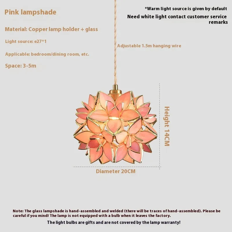 Stained glass line chandelier hanging from ceiling with colourful glass shades and copper lamp head