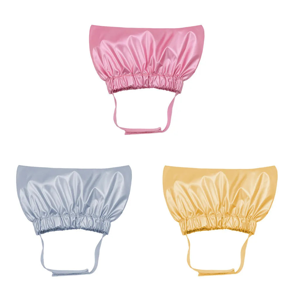 Adjustable waterproof shower cap for dogs and cats in silver, pink, and gold colours with ear protection