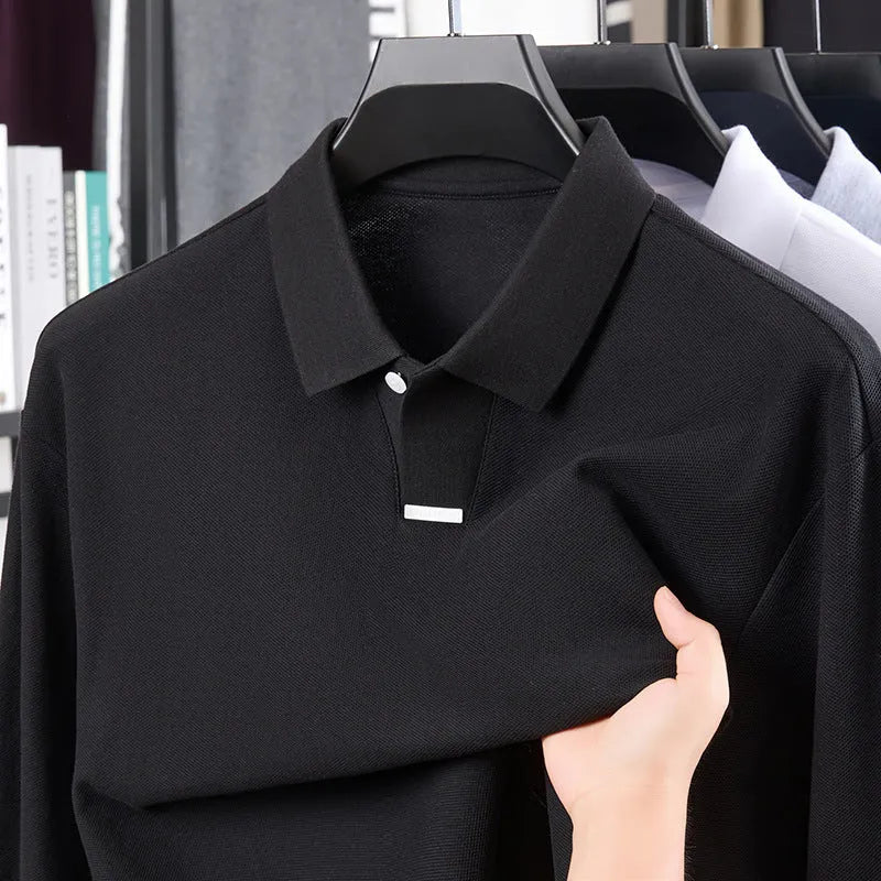 Men's grey loose-fit long sleeve cotton polo shirt with a lapel collar on a hanger.