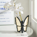 White ceramic butterfly vase and matching tissue box with waterproof coating