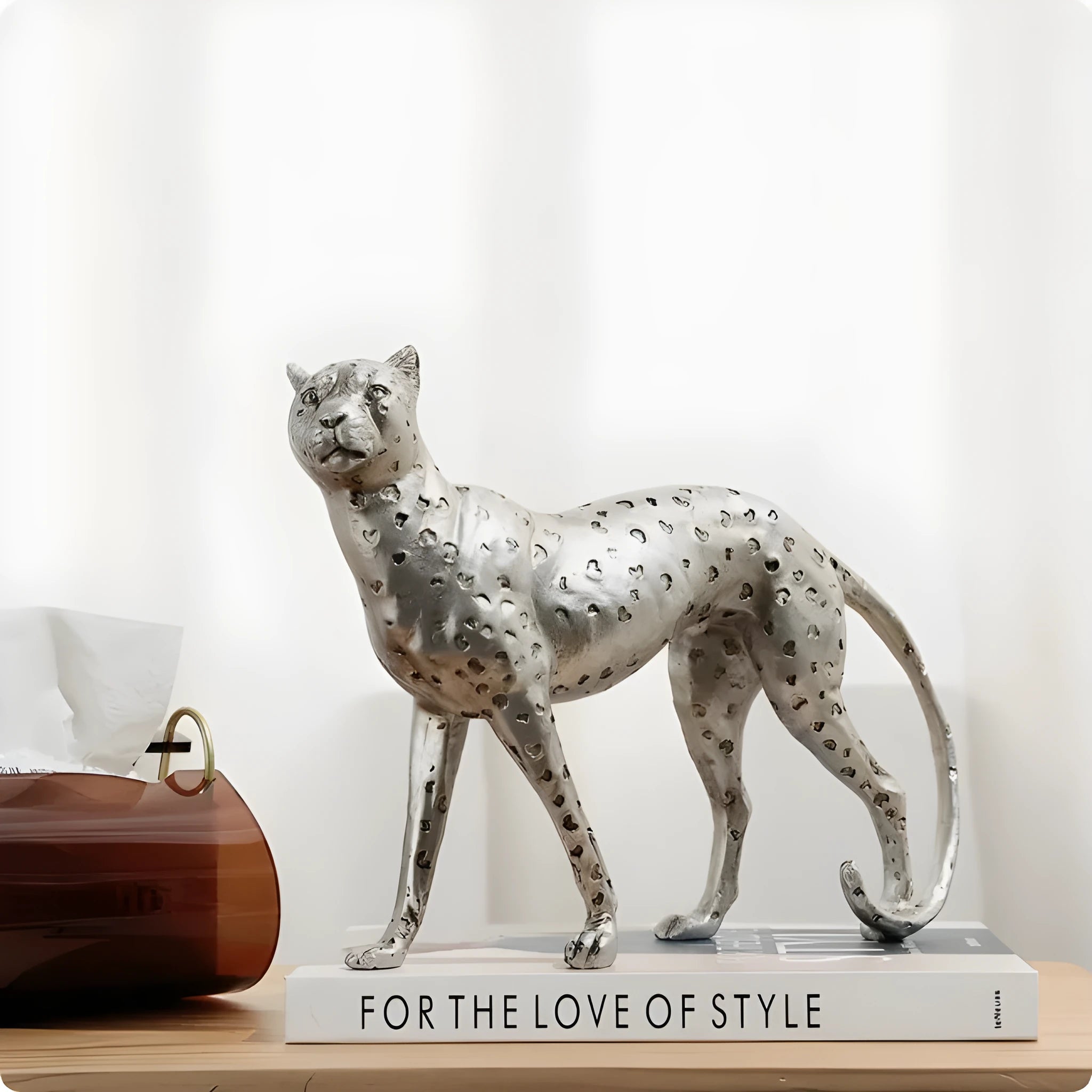 Leopard resin ornament in American Leopard colour on a shelf