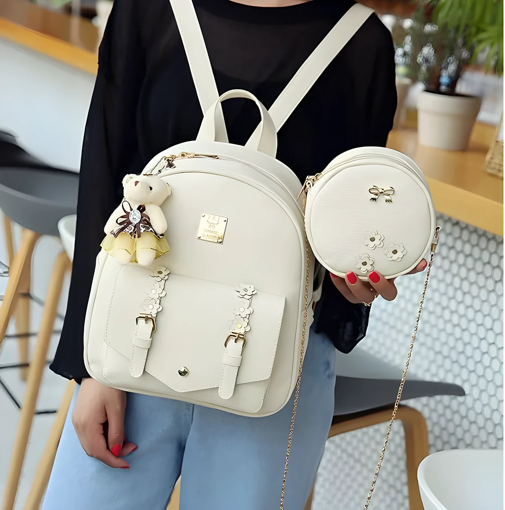 Three-piece PU leather backpack set for teenage girls in four colours with floral detailing