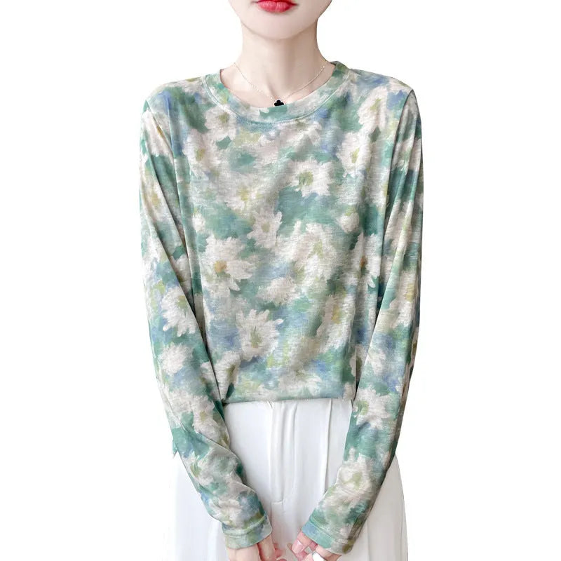 Women's round neck floral print pullover shirt in Tencel cotton fabric on a model.