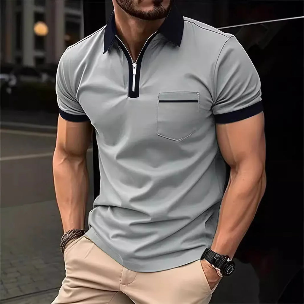 Man wearing a loose-fit casual short sleeve shirt with a chest pocket and contrast collar.
