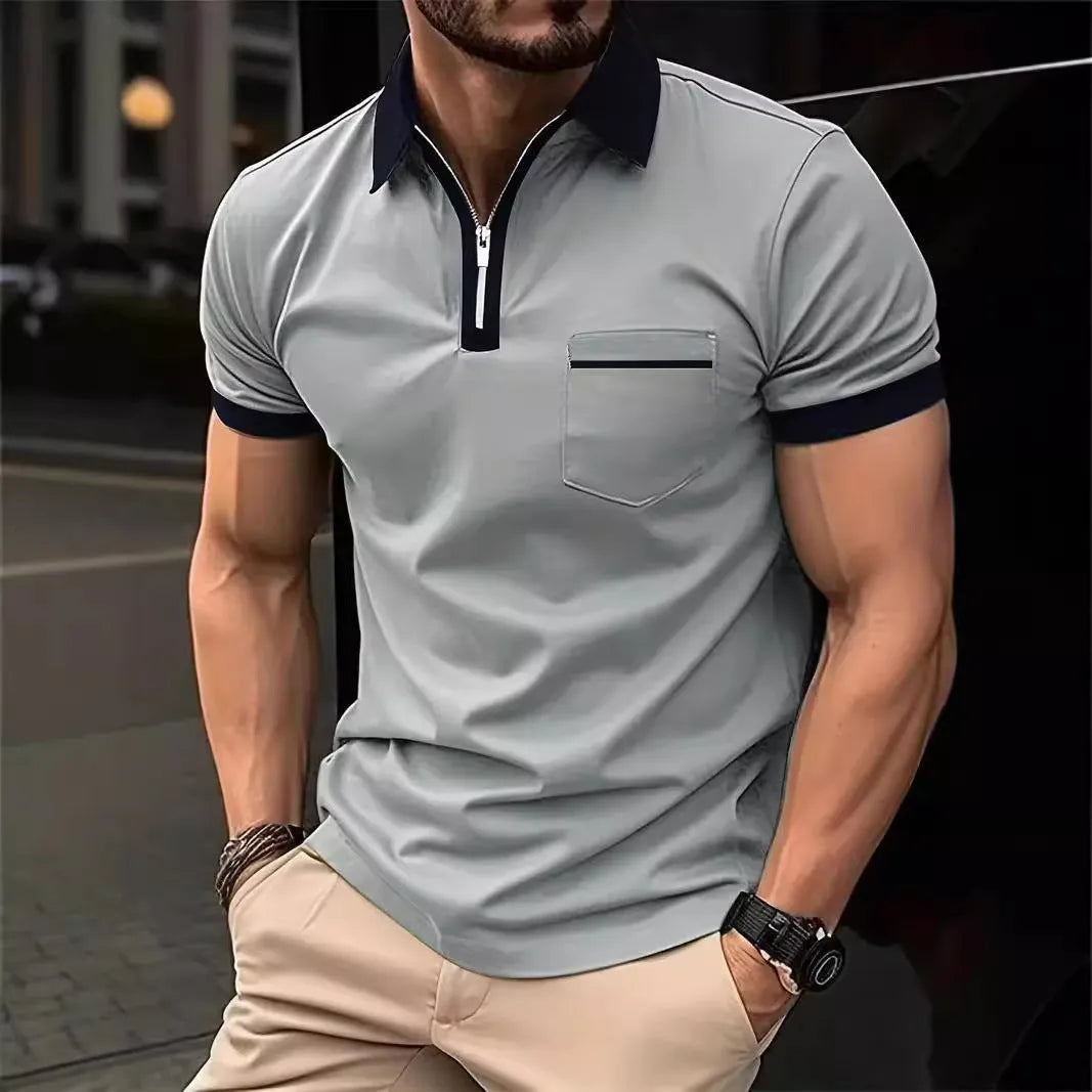 Man wearing a loose-fit casual short sleeve shirt with a chest pocket and contrast collar.