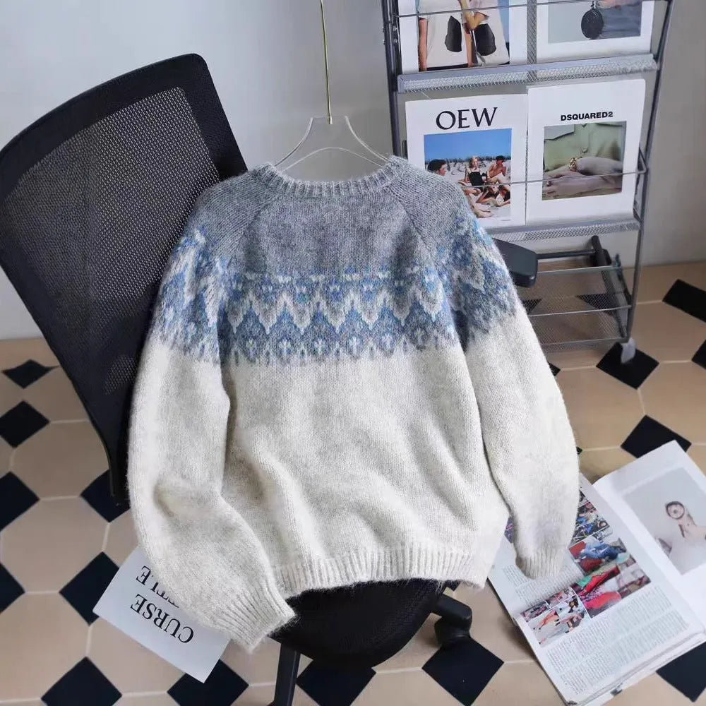 Women's loose-fitting jacquard knit sweater coat in a contrast colour pattern.