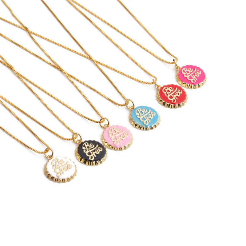 Copper bottle cap pendant necklace on a 40 cm box chain with an 18K gold colour electroplated finish.