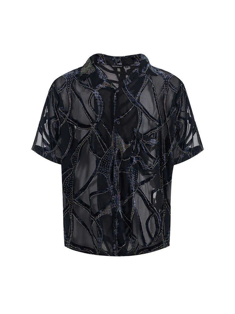 Man's black and grey short-sleeved shirt with translucent snake pattern, loose fit with lapel collar.