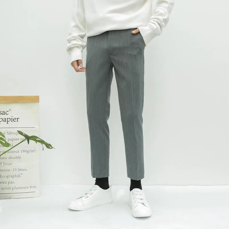 Men's straight-leg cotton trousers with drawstring waist in black, grey, and khaki colours