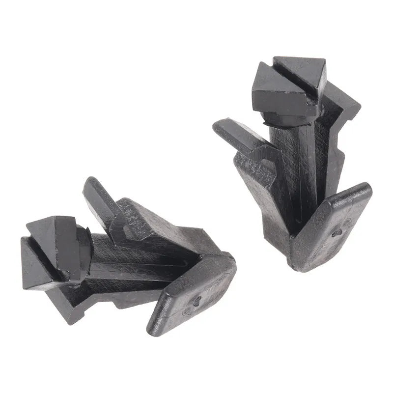 Black plastic bumper cover and radiator grille fastening clip for Nissan vehicles, model 76882-0M060.