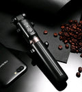 Aluminium alloy Bluetooth selfie stick with remote control and adjustable phone clip next to a smartphone