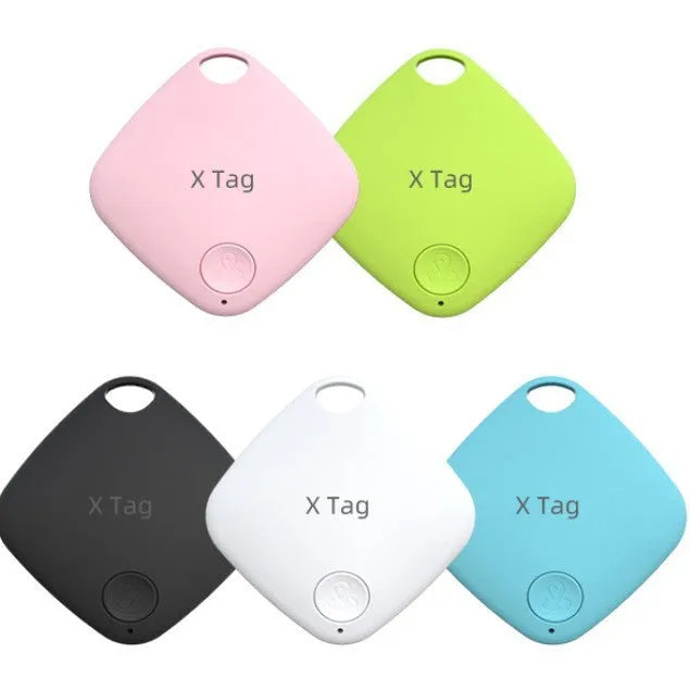 Diamond Global Bluetooth anti-lost tracker in black, shown next to a set of keys for scale.