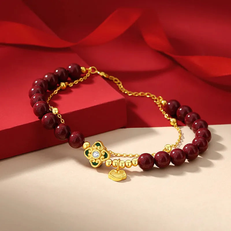 Sterling silver women's bracelet with geometric shape, Ruyi Xiangyun design, and cinnabar flower detail.
