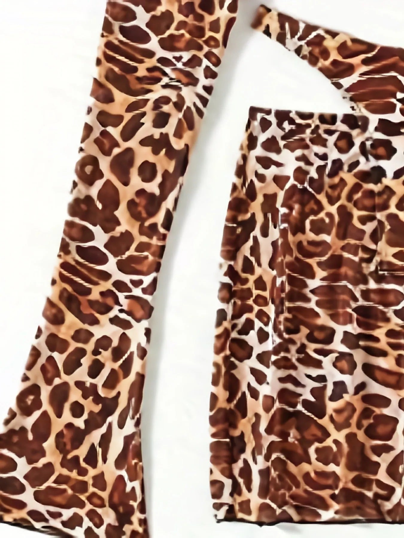 Leopard print women's bikini swimsuit set with halter top and high-waisted skirt bottom