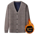 Men's grey batwing sleeve cardigan with velvet lining, shown on a hanger.