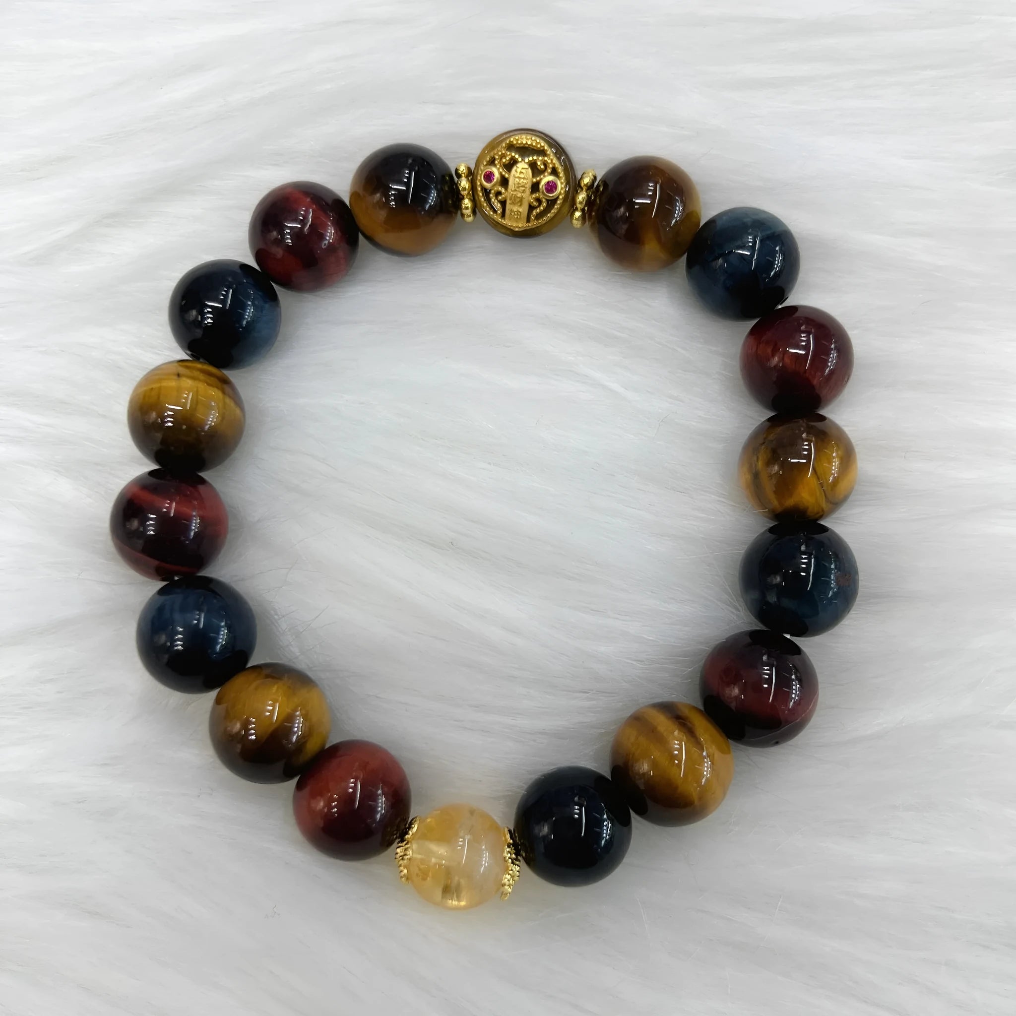 Brown tigereye stone round beads on Maillard chain bracelet showing natural banding patterns