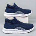 Popcorn Flyknit fabric casual sneaker in low-top design with round toe available in white, black, and blue colours