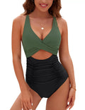 Women's black high-waist one-piece swimsuit with cross-back straps and pleated front detail.