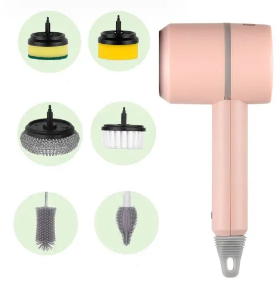 White rechargeable electric cleaning brush with multiple scrubber heads on a kitchen worktop.