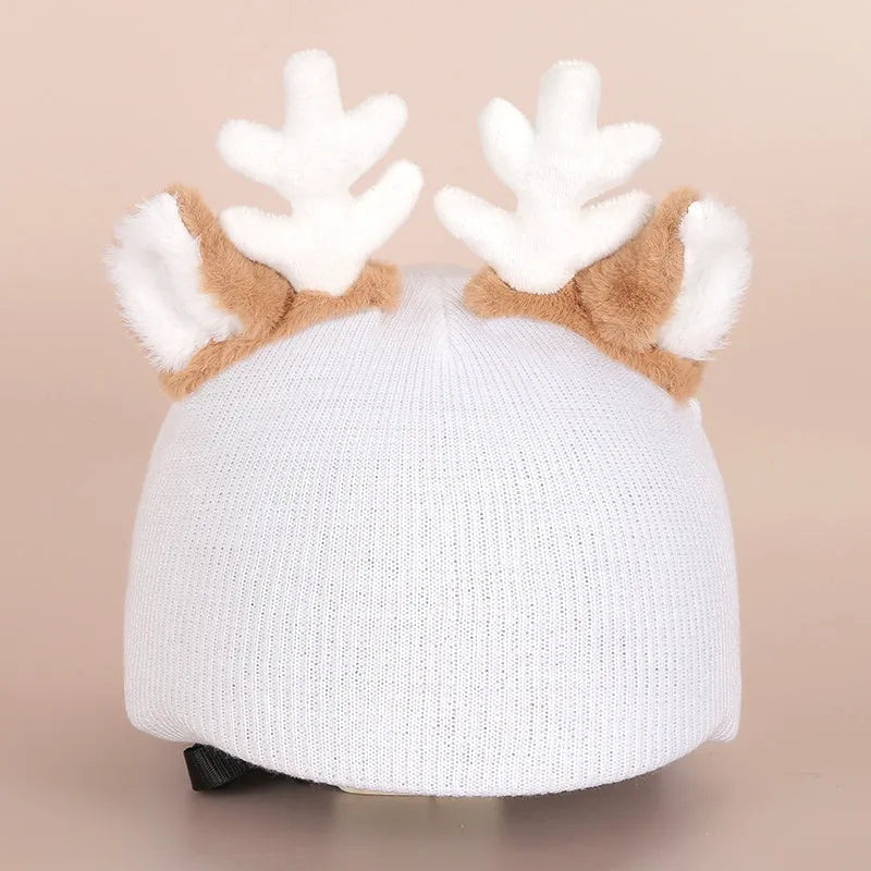 Plush cartoon-themed cover set on a medium motorcycle helmet with soft ear decorations.
