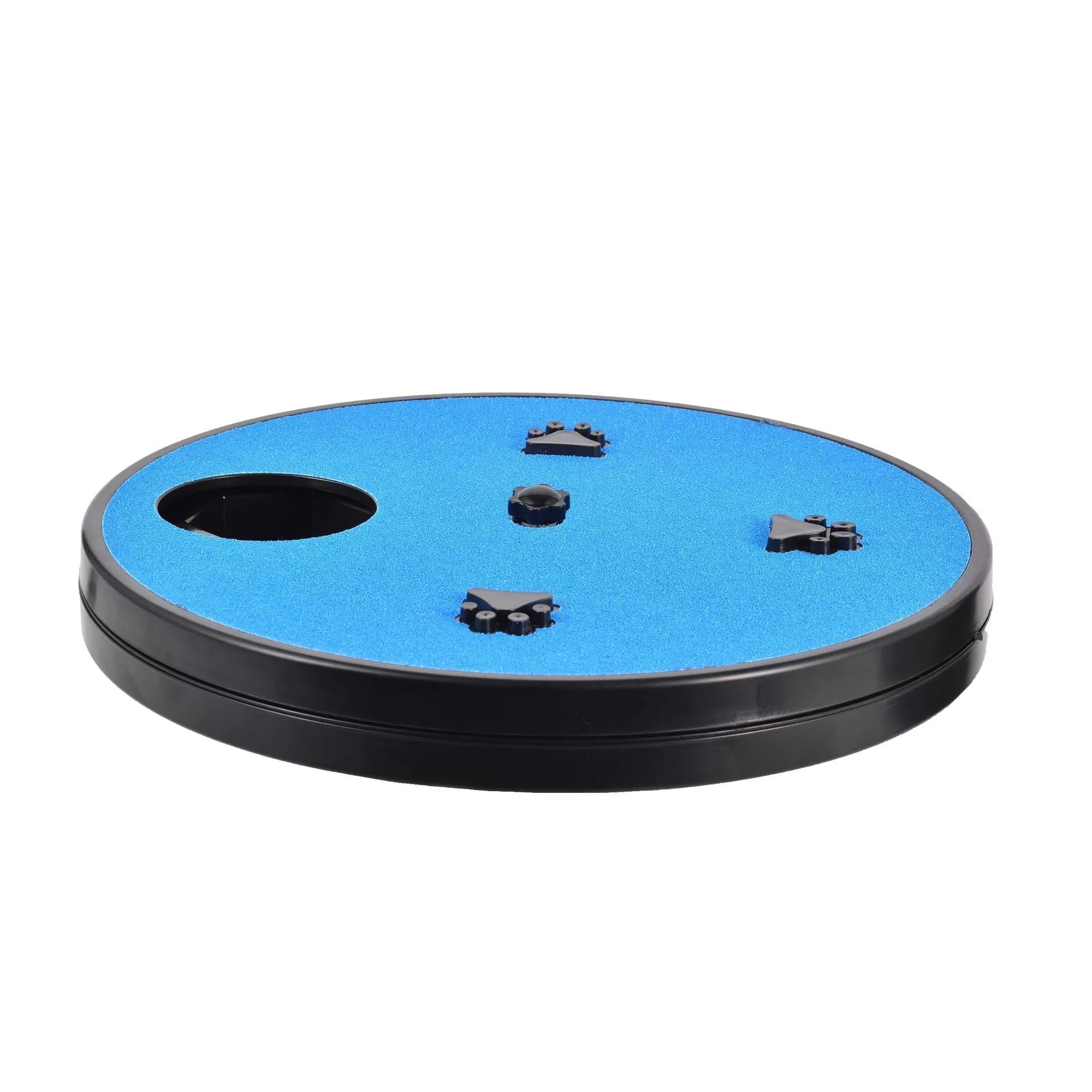 Square blue dog nail file scratching board with rotatable top and suction cup base on a wooden floor.