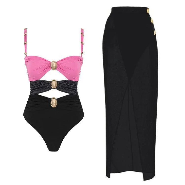 Green women's one-piece swimsuit with round buckle decoration and hollow out stitching on nylon fabric.