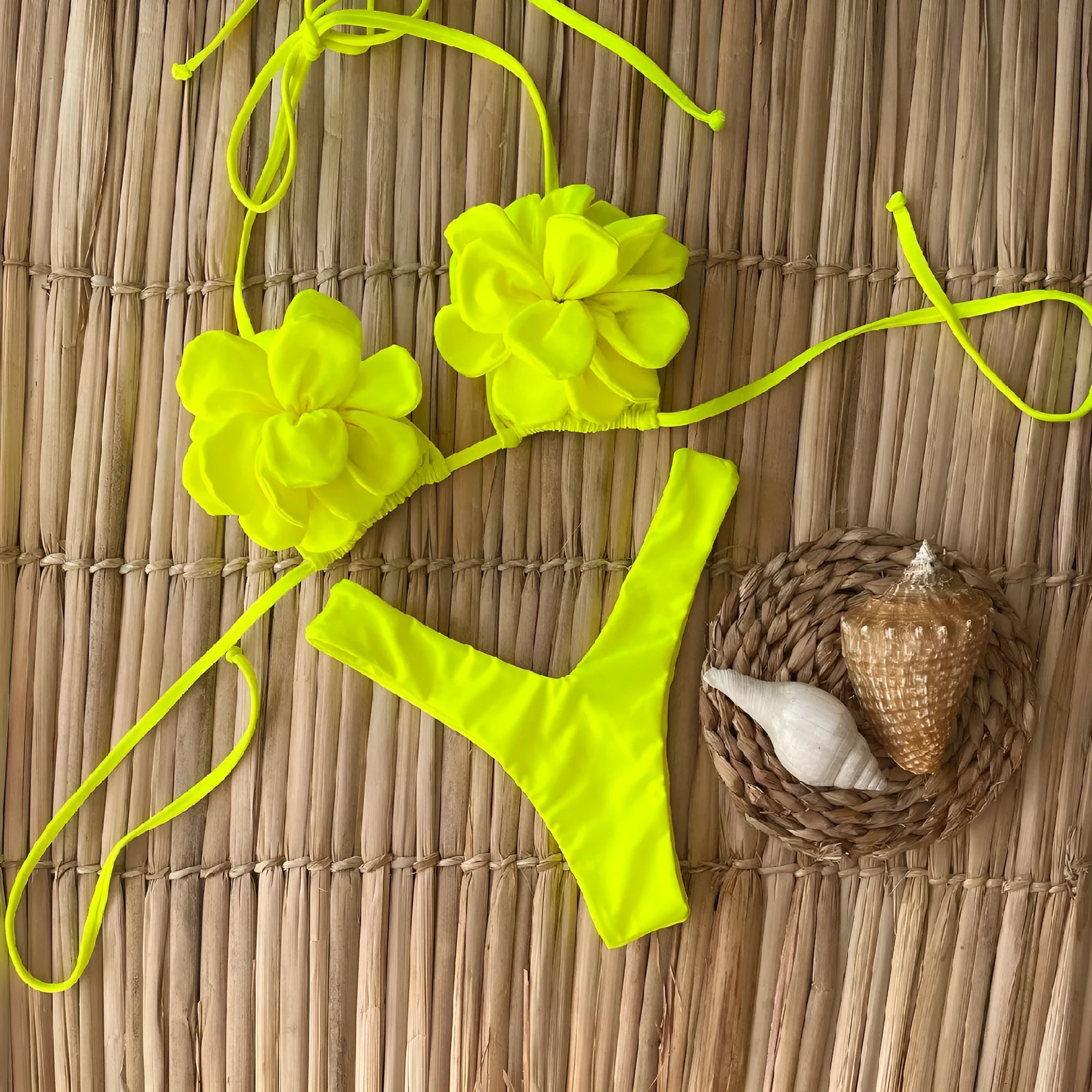 Women's 3D flower low waist bikini swimsuit in solid colour with backless briefs style.