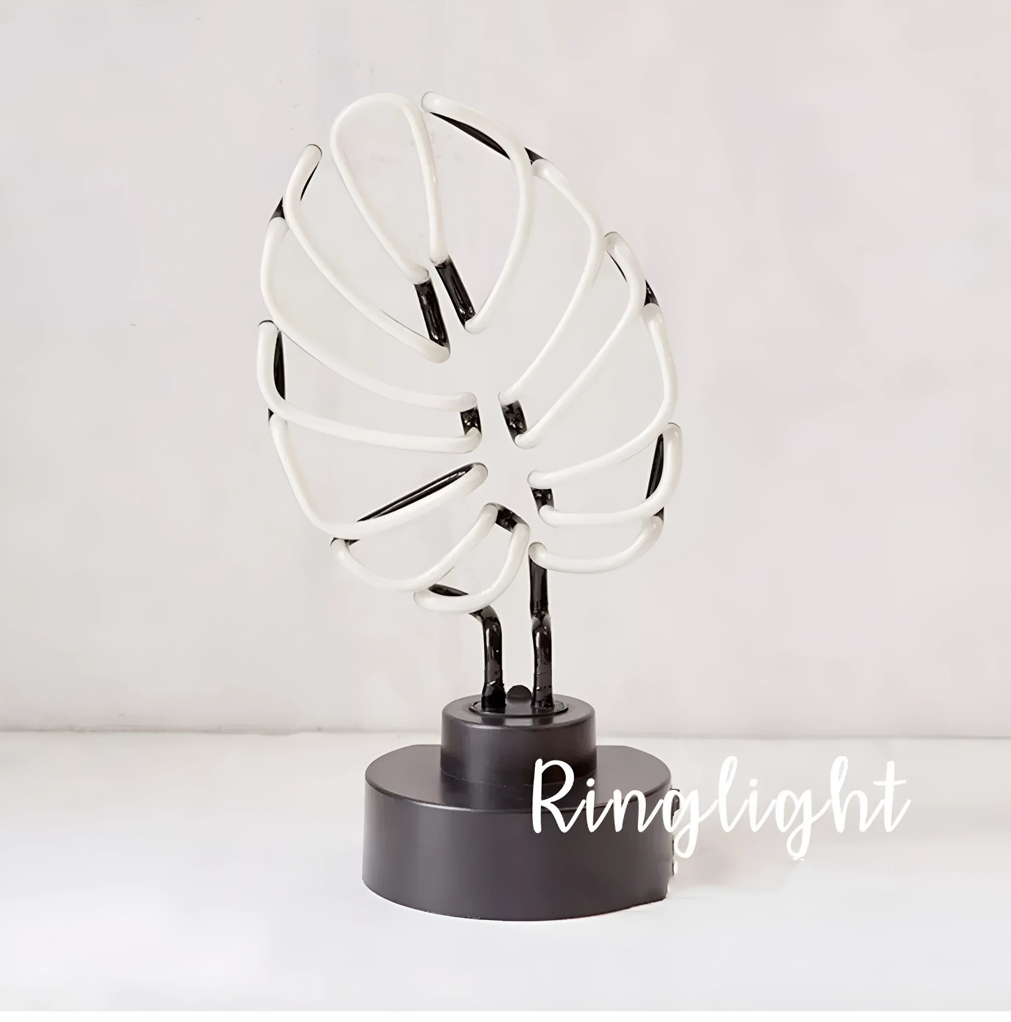Handmade bamboo-shaped white and green USB desktop lamp in two sizes.