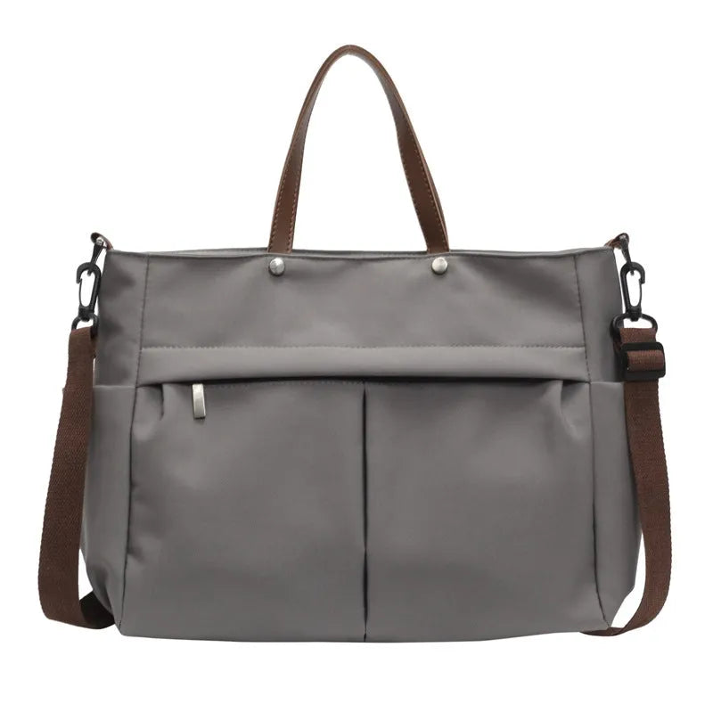 Nylon crossbody tote bag for women in black, grey, white, or green, showing 39x14x28 cm dimensions