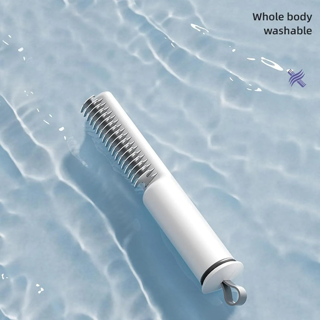 Stainless steel pet dematting comb with ergonomic handle for removing dog hair knots and mats.