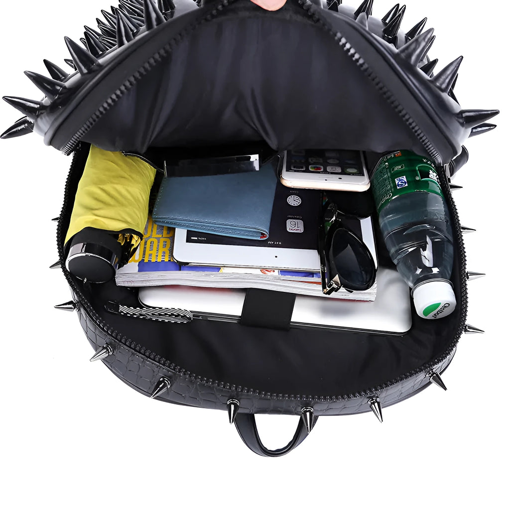 Black oval punk style women's backpack made of PU leather with air cushion straps and open pockets.