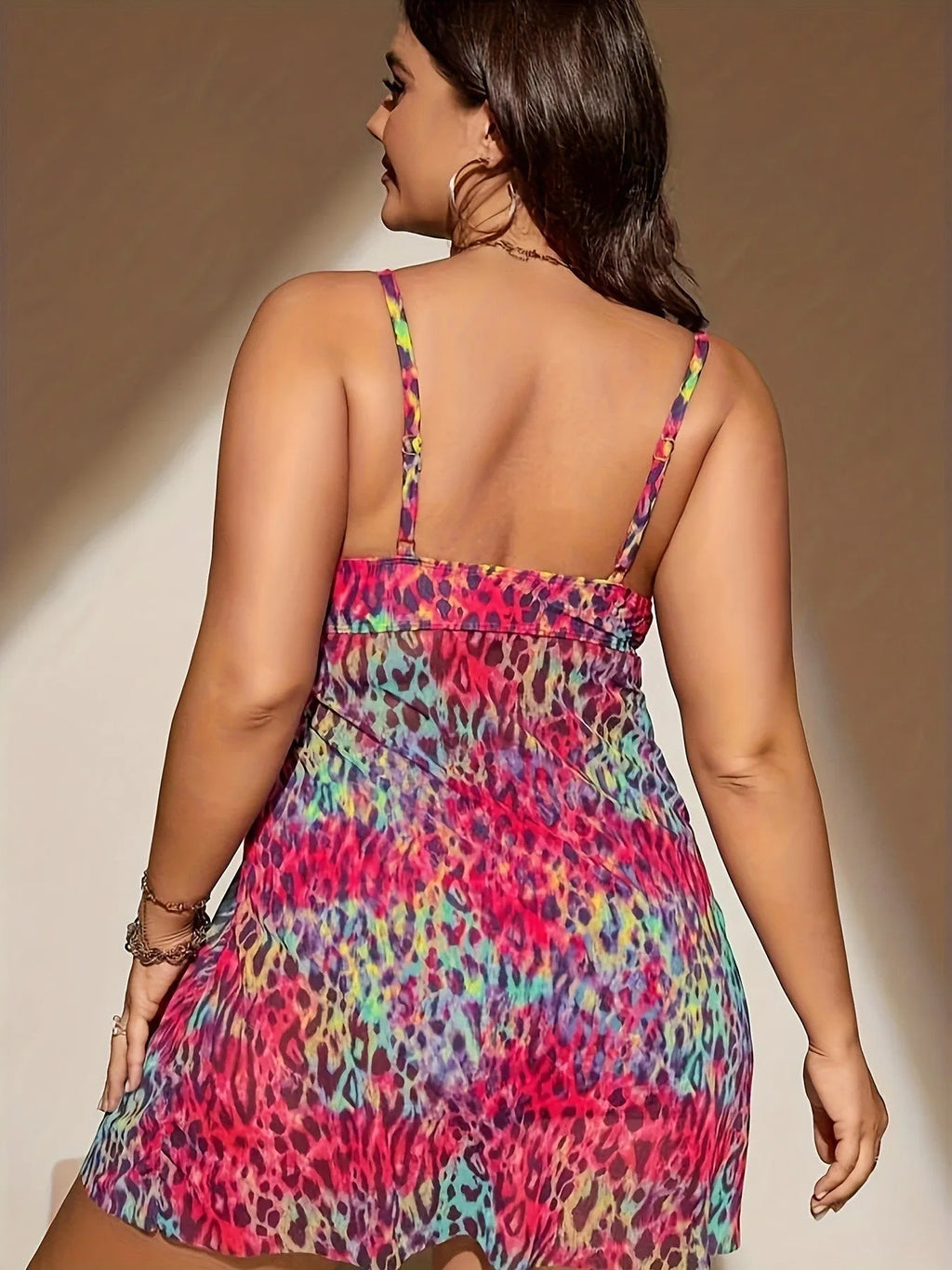 Plus size women's skirt split bikini swimsuit set in blue polyester fabric.