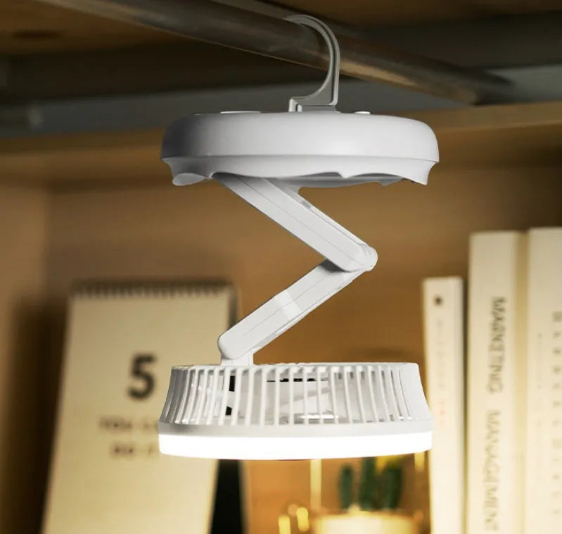 Blue foldable USB desk fan with LED light, shown in open position with 300° head tilt