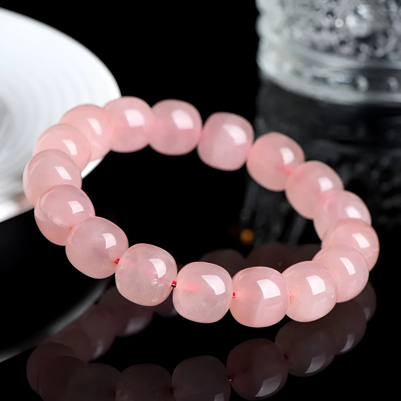 Pink barrel-shaped crystal bead bracelet with geometric 8-10mm beads